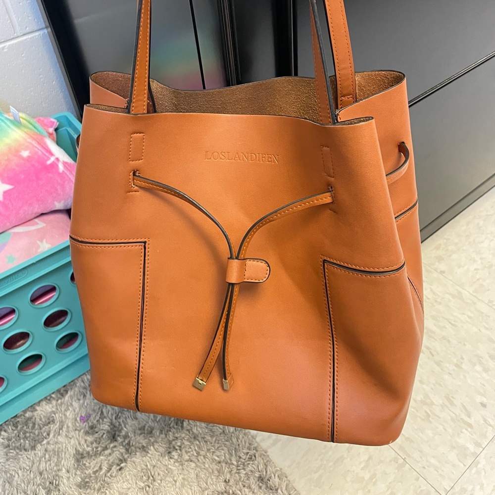 Genuine Leather bucket with rope to cinch purse!!